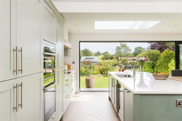 Shaker kitchen with an open view